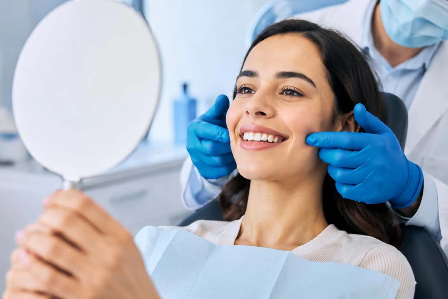 Dentist consulting with patient about Invisalign treatment