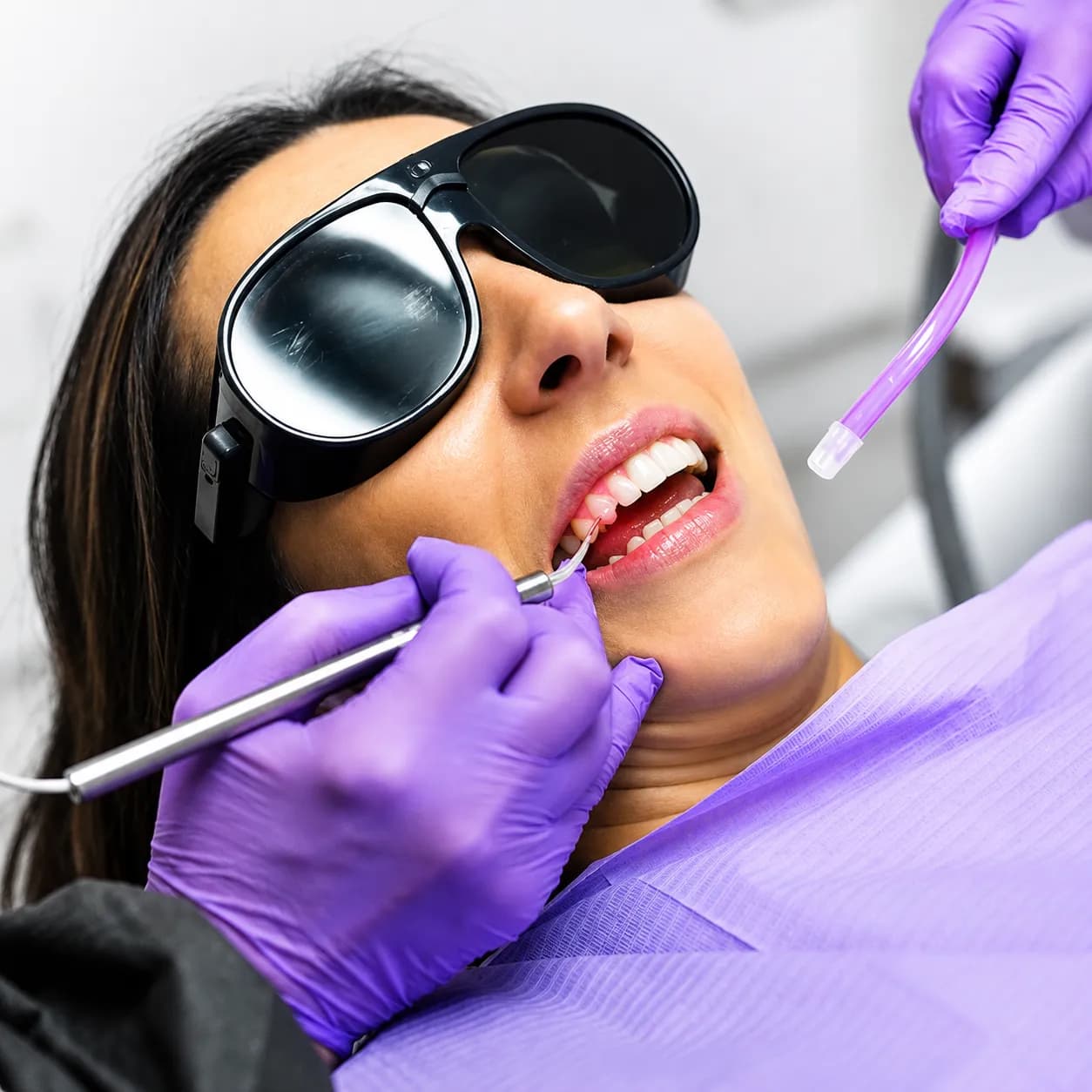 Dental laser curing light being used during a procedure