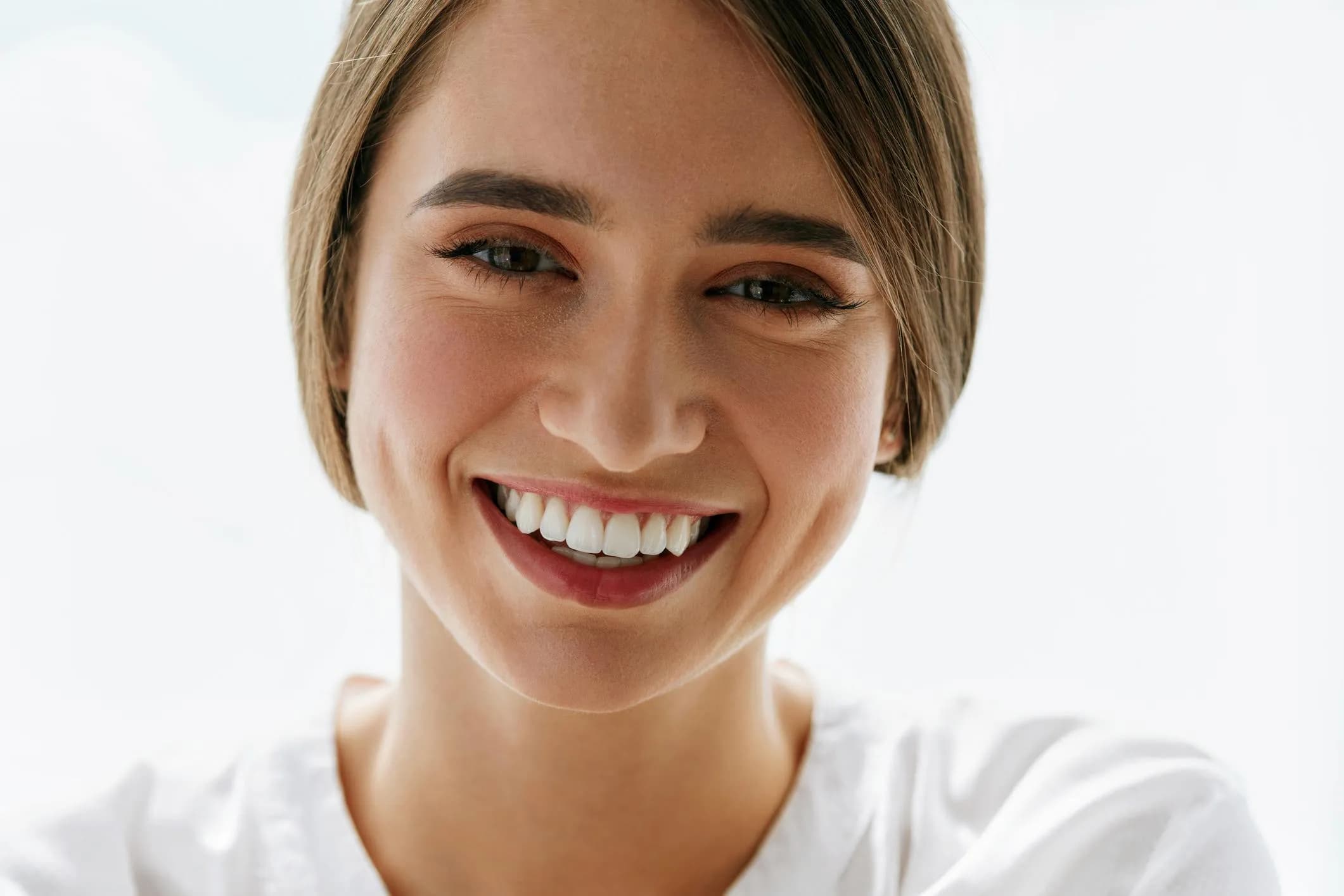 Dentist performing a restorative dental procedure on a patient