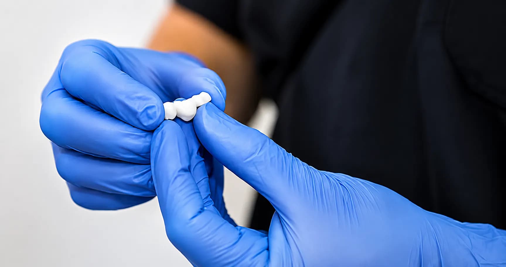Dental team performing a precise restorative procedure