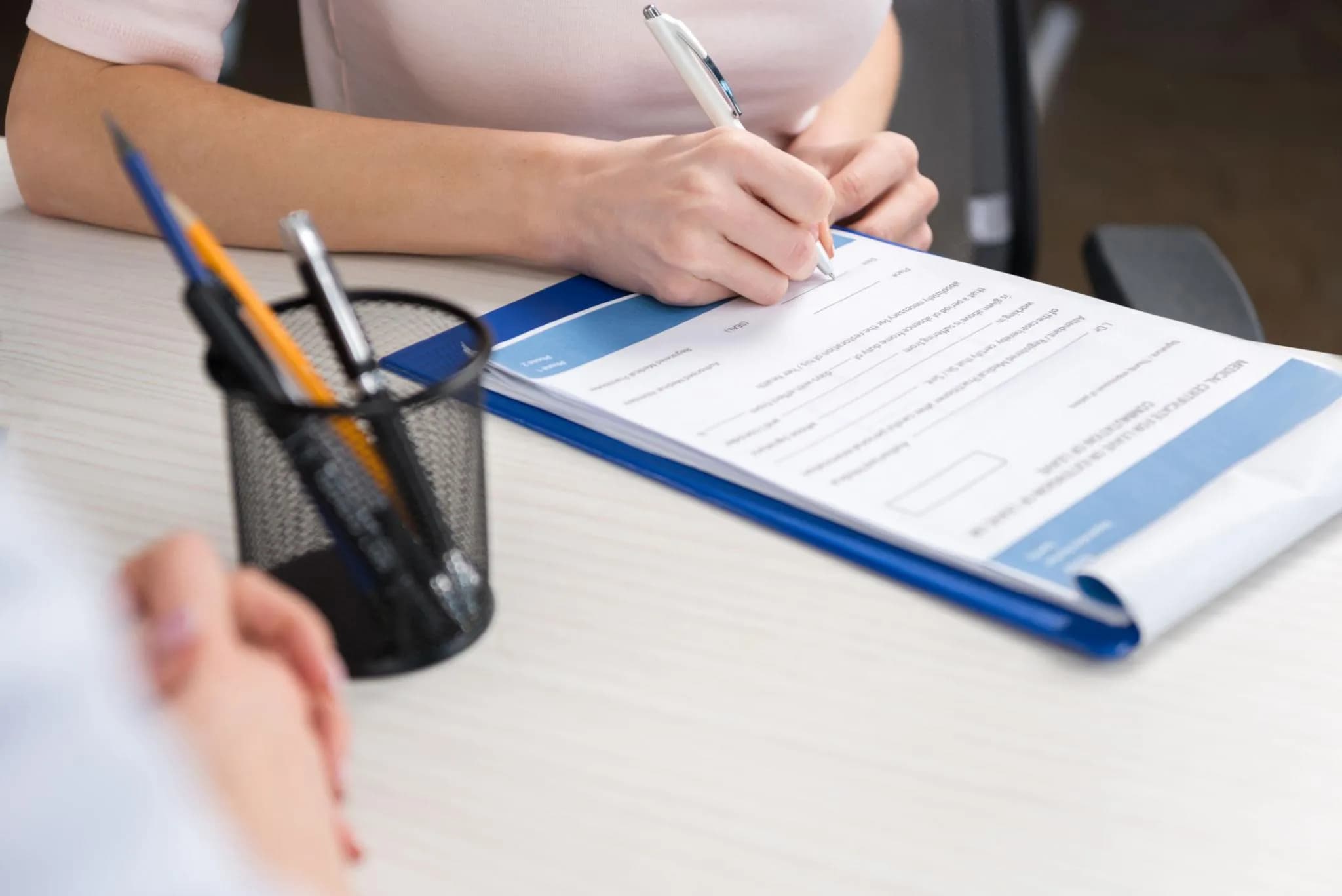 Doctor consulting with patient about sleep apnea treatment